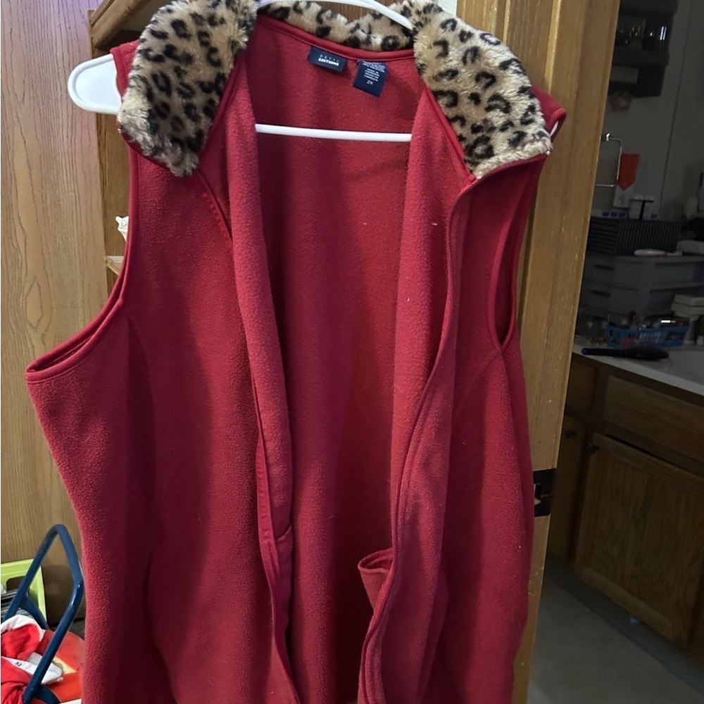 Women’s sweater vest. Red with animal print collar